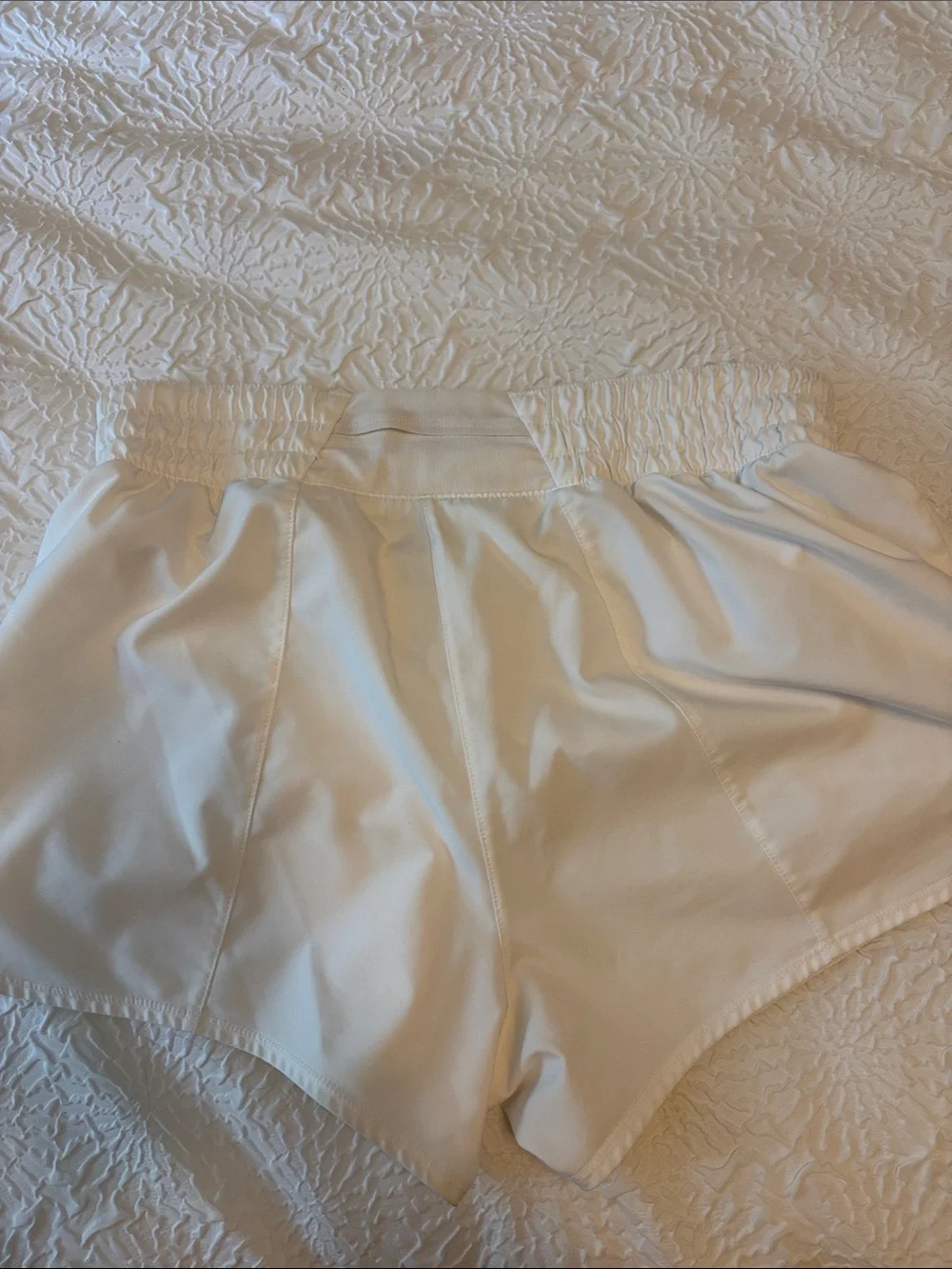 Nike Women's White Athletic Shorts with Silver Swoosh